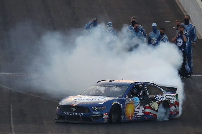 Kevin Harvick does a burnout at Indianapolis.
