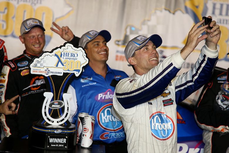 Kevin Harvick celebrates in Victory Lane at Kentucky.