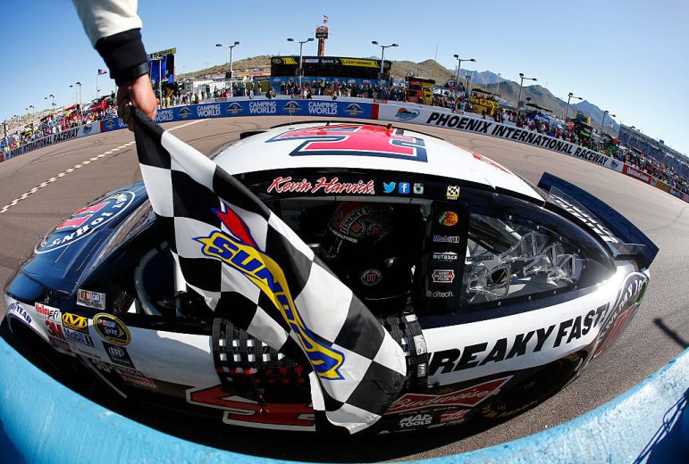 Kevin Harvick celebrates after winning at Phoenix.
