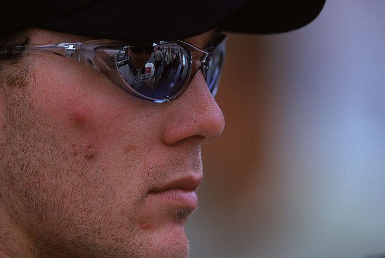 Kevin Harvick looks on,