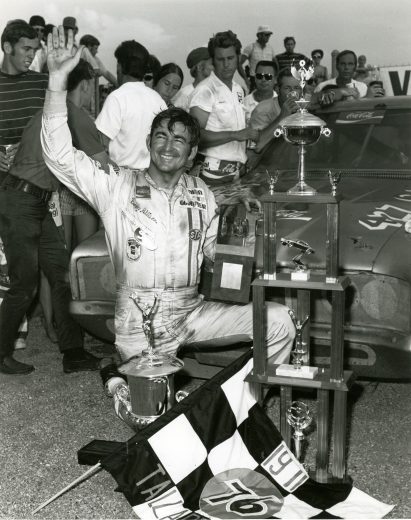 Bobby Allison celebrates in Victory Lane
