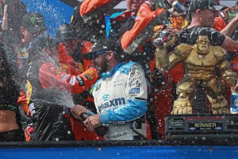 Martin Truex Jr. celebrates in Victory Lane