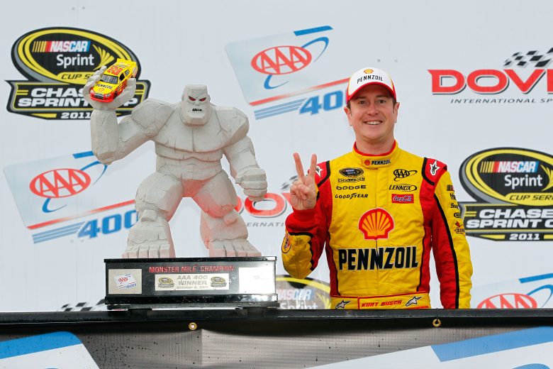 Kurt Busch poses with trophy in Victory Lane.