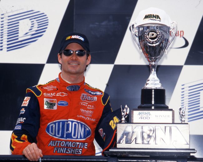 Jeff Gordon poses with trophy in Victory Lane.