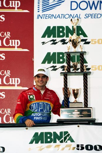 Jeff Gordon poses with trophy in Victory Lane.