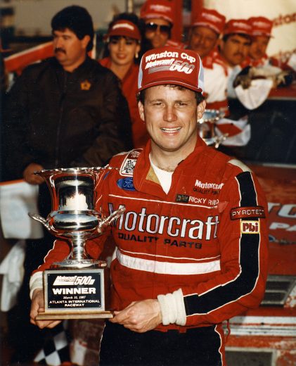 Ricky Rudd hold trophy.