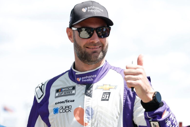 Shane van Gisbergen gives a thumbs up.