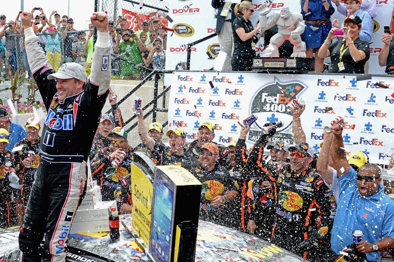 Tony Stewart celebrates in Victory Lane.