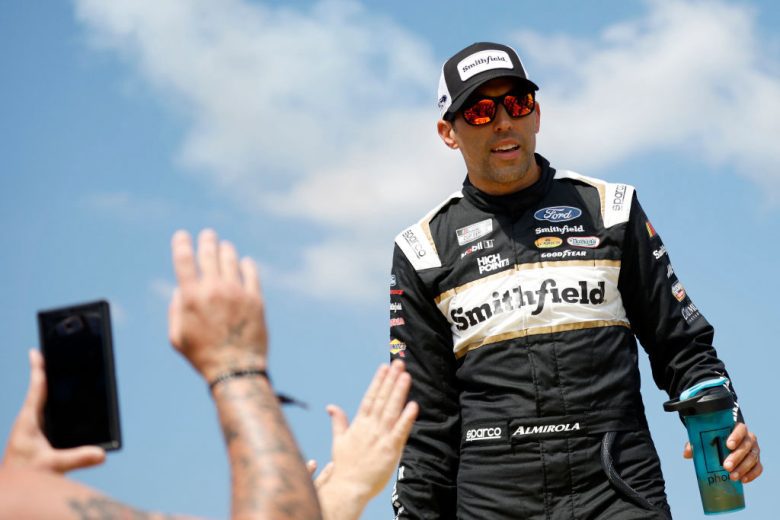 Aric Almirola greets fans.