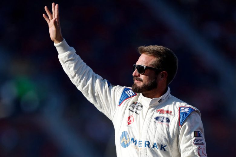 JJ Yeley waves to the crowd.