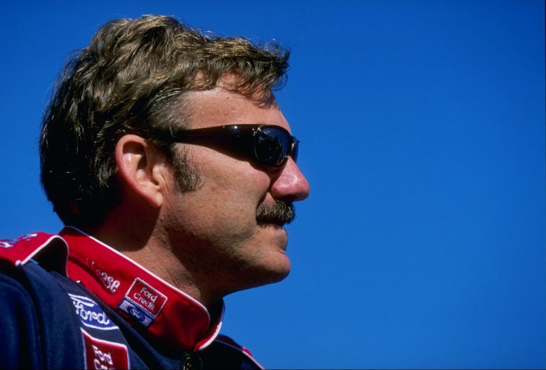 Dale Jarrett looks on