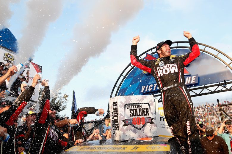 Martin Truex Jr. celebrates in victory lane