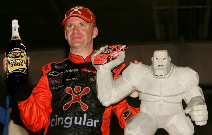 Jeff Burton poses with trophy in Victory Lane.