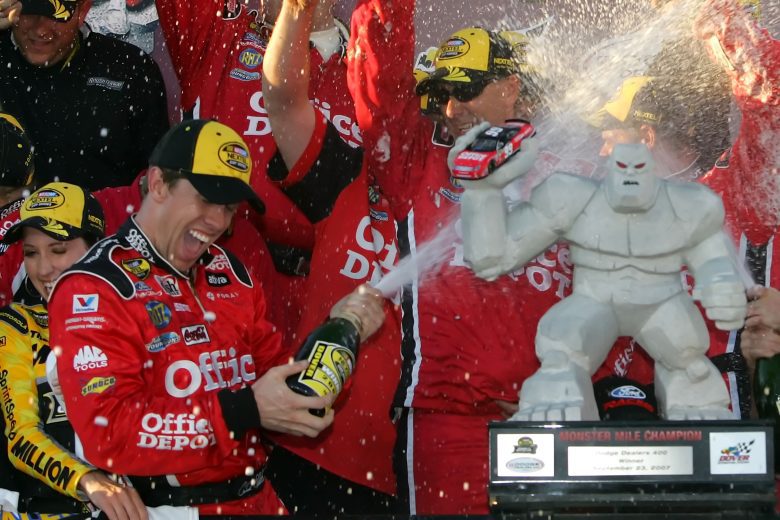 Carl Edwards sprays champagne in Victory Lane.