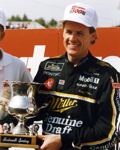 Rusty Wallace poses with trophy in Victory Lane.