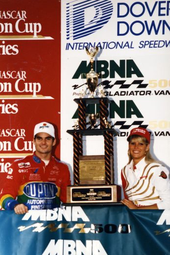 Jeff Gordon poses with trophy in Victory Lane.