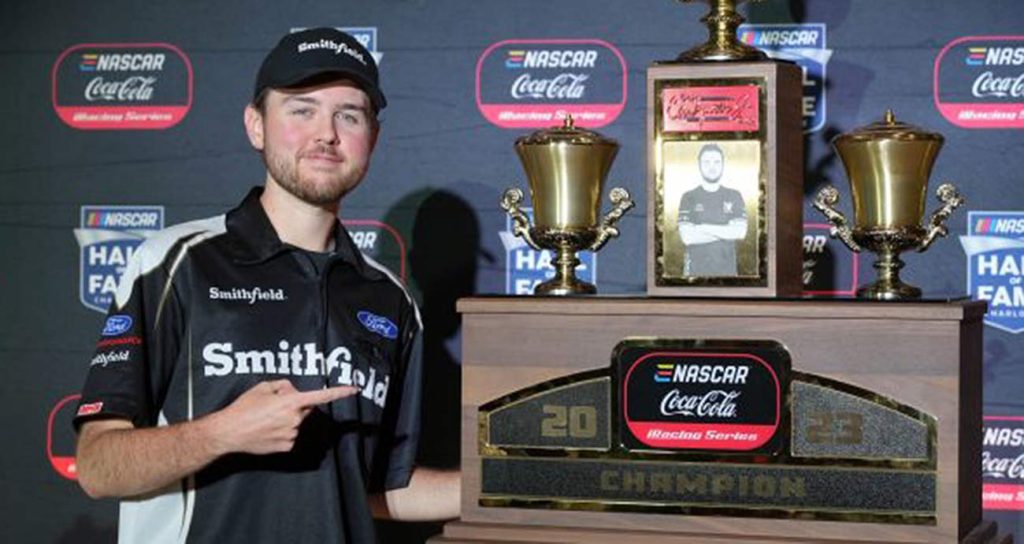 Steven Wilson with the eNASCAR Coca-Cola iRacing Series trophy