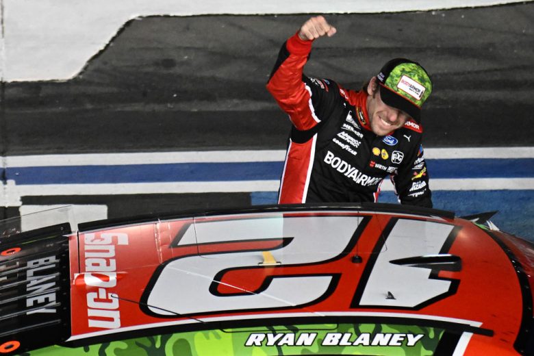 Ryan Blaney celebrates winning at Charlotte.