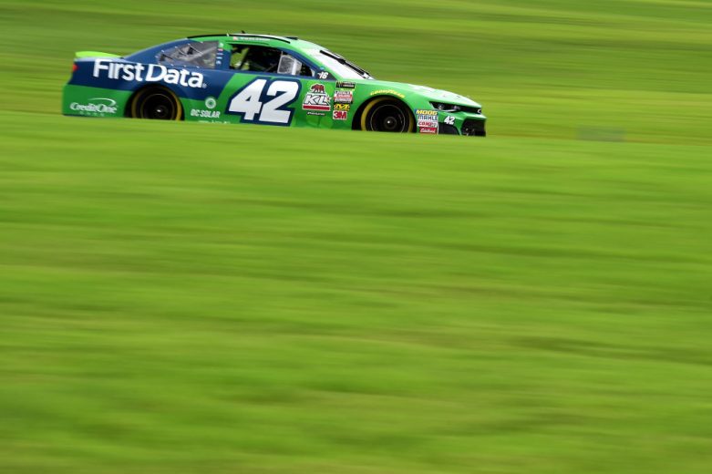 Kyle Larson drives at Charlotte.