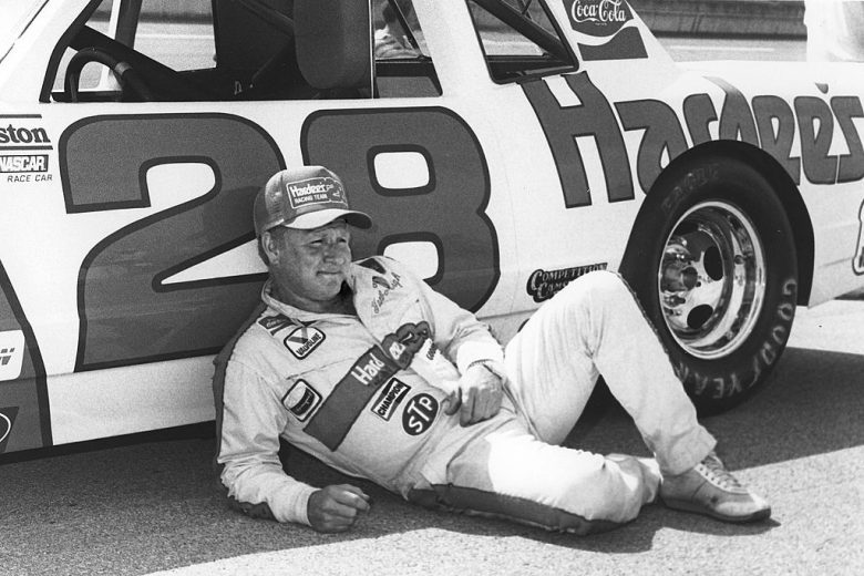 Cale Yarborough sits by his car.