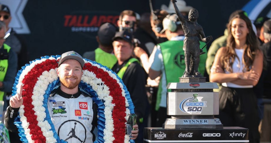 Tyler Reddick celebrates in Victory Lane at Talladega.