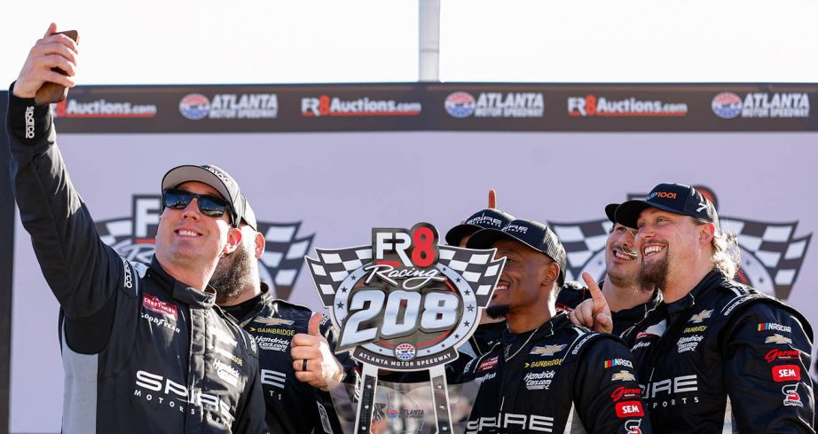 Kyle Busch takes a selfie with his pit crew following his NASCAR Craftsman Truck Series win at Atlanta Motor Speedway.