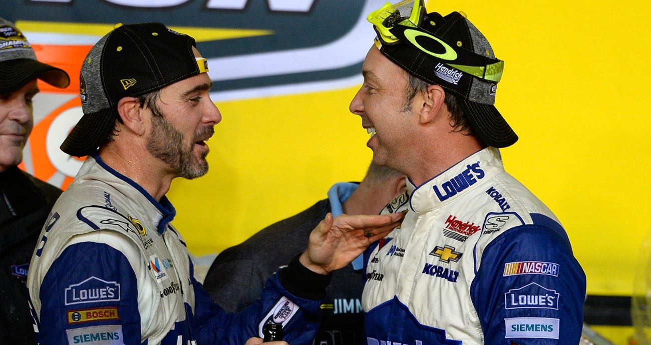 Jimmie Johnson shares a moment of celebration with Chad Knaus