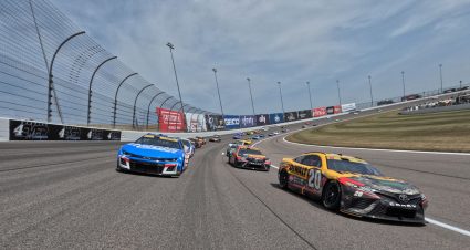 NASCAR Cup Series cars prepare for a restart.