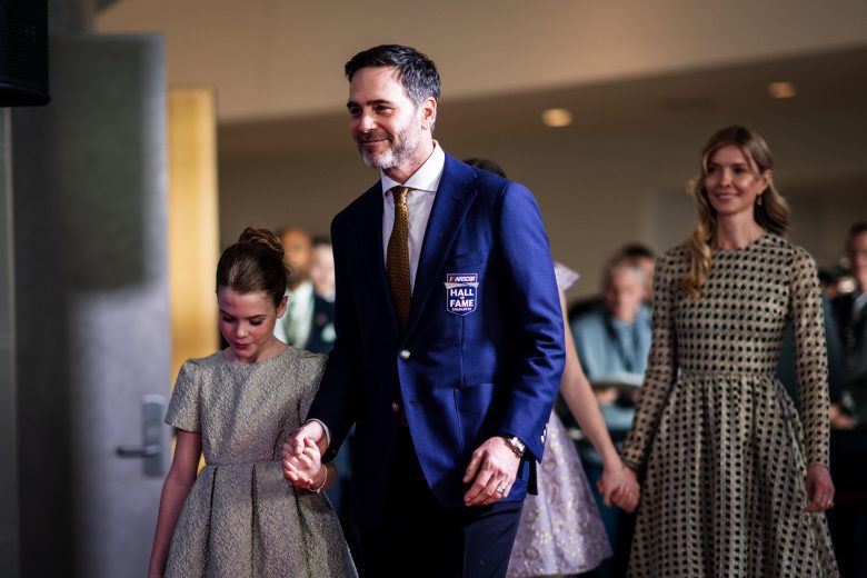 Jimmie Johnson walks with his family