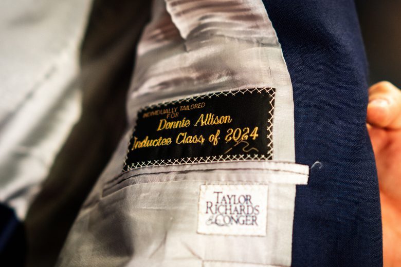 A close up picture of focusing on the inside of patch of Donnie Allison's Hall of Fame jacket.