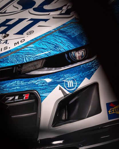 Close up view of the front headlight of the number one Busch Light Chevrolet