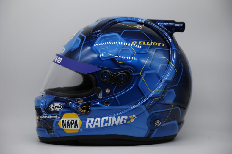 Side profile view of Chase Elliott's blue honeycomb racing helmet