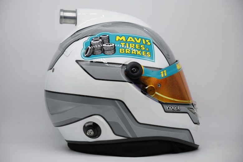 Side profile view of Denny Hamlin's gray and white racing helmet