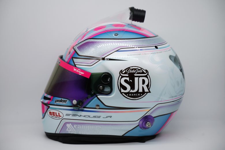 Side view of Ricky Stenhouse Jr.'s white blue and pink racing helmet.