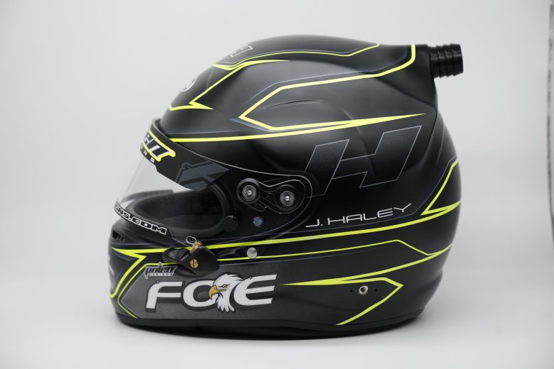 Side view of Justin Haley's black and yellow racing helmet