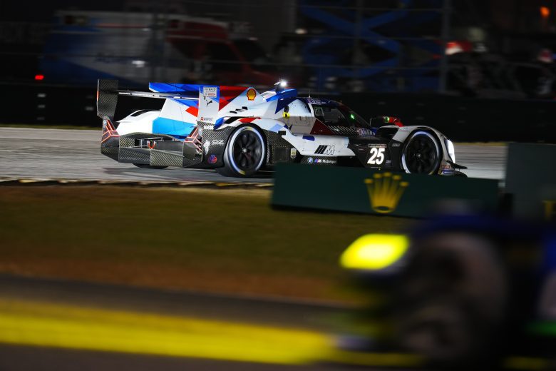 BMW hybrid car driving at night