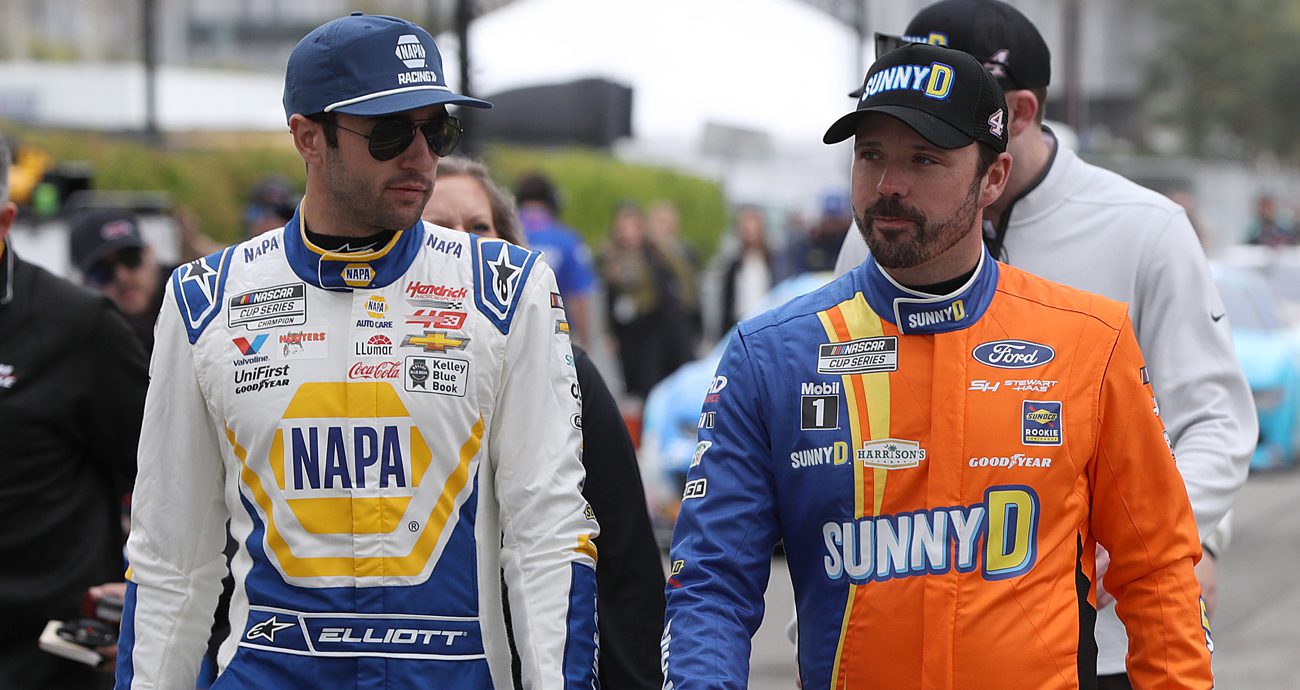 Chase Elliott, left, and Josh Berry walk to their cars at the LA Memorial Coliseum.