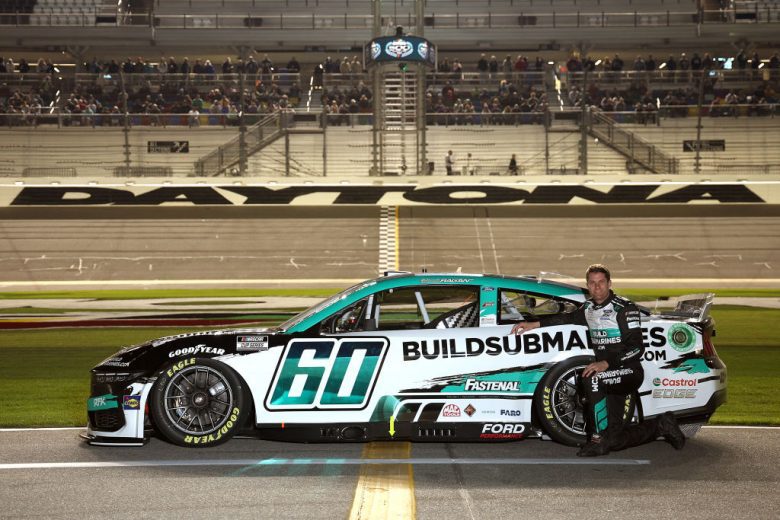 David Ragan poses in front of his No. 60 Ford at Daytona International Speedway.