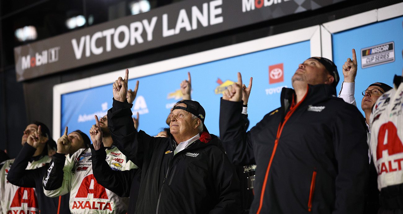 rick hendrick in victory lane with team