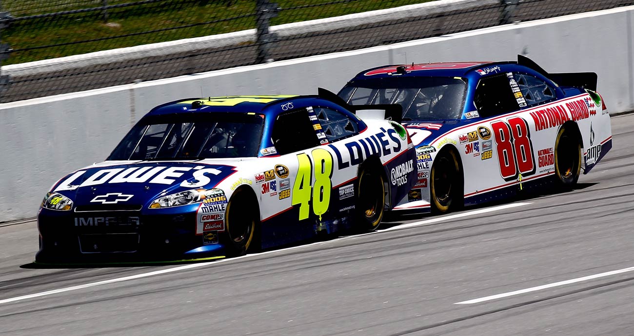 Jimmie Johnson, in the No. 48 Chevrolet, races ahead of Dale Earnhardt Jr., driver of the No. 88 Chevrolet, at Talladega Superspeedway.