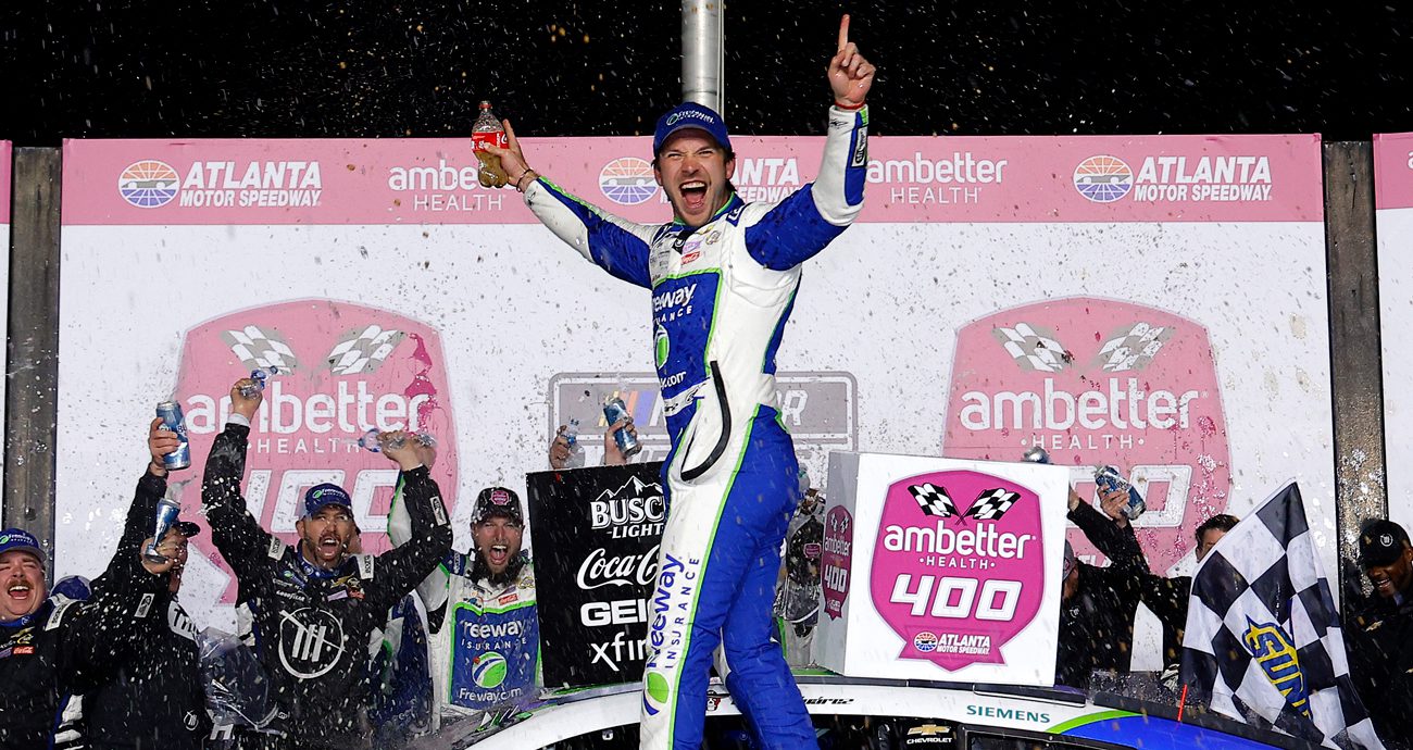 Daniel Suárez celebrates his Atlanta win in Victory Lane.