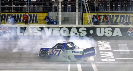Rajah Caruth performs a burnout at Las Vegas after winning the 2024 NASCAR Craftsman Truck Series race.