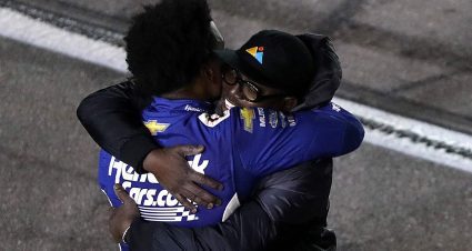 Roger Caruth embraces his son, Rajah, on the frontstretch at Las Vegas Motor Speedway after a Craftsman Truck Series win