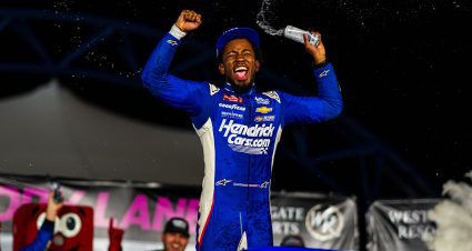 Rajah Caruth celebrates in Victory Lane.