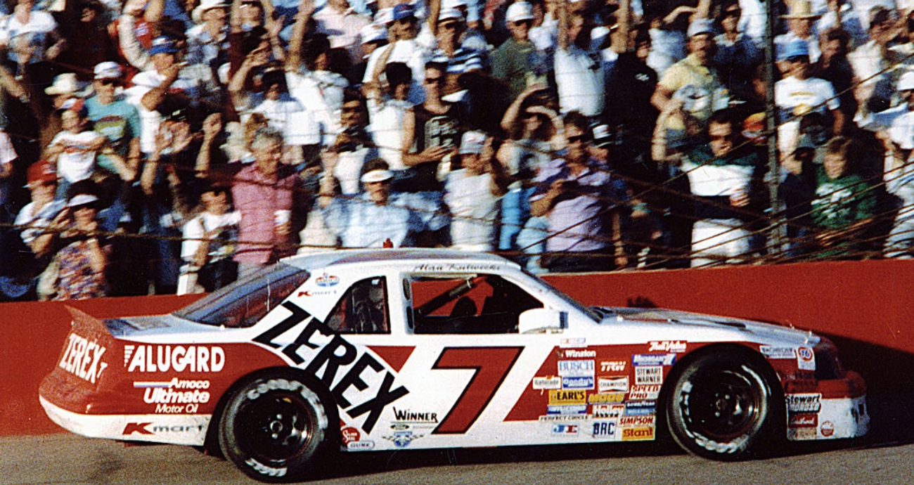 Alan Kulwicki celebrates after winning at Phoenix.