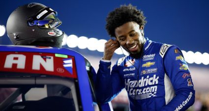 Rajah Caruth smiles and prepares to climb into his NASCAR Craftsman Truck Series vehicle at Las Vegas.