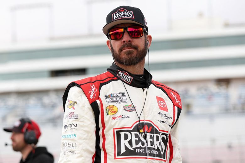 Martin Truex Jr. looks on.
