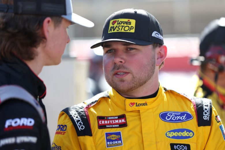 Layne Riggs and Conner Jones look on at Bristol.