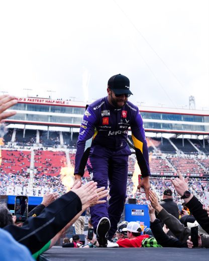Bubba Wallace high fives fans