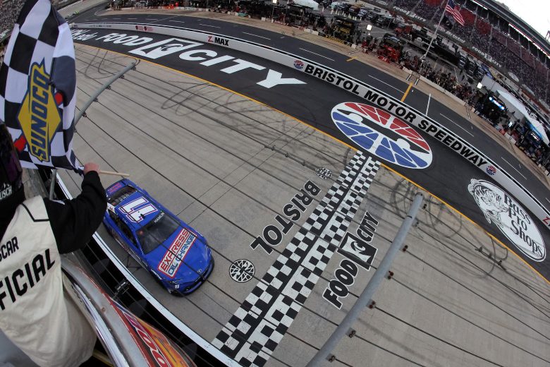 Denny Hamlin crosses the finish line.